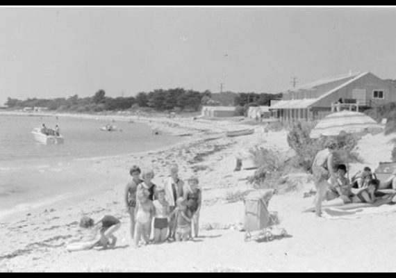 Beach with Boat Club building in the middle ground, c.1954. Source: La Trobe Picture collection, State Library of Victoria, image H32492/9589.