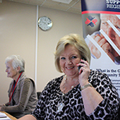 one of our friendly volunteers on the phone