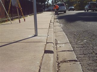 Example of poor kerb and channel condition